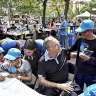 El presidente de la Fundación Bancaria ‘La Caixa’, Isidro Fainé, con los niños del programa CaixaProinfancia.-E. M.