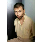 Adem Karadag detenido en un apartamento en las afueras de Bangkok, como presunto autor del atentado del 17 de agosto.-THAI ROYAL POLICE/EFE