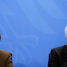 La cancillera Merkel y el ministro de Interior, en una imagen de archivo.-AFP / ODD ANDERSEN