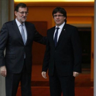Mariano Rajoy (izquierda) y Carles Puigdemont, el pasado mes de abril.-DAVID CASTRO