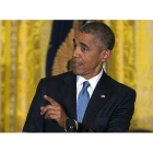 Obama, contestando a la activista en la recepción en la Casa Blanca-Foto: AP / EVAN VUCCI