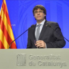 El 'president' Puigdemont en la rueda de prensa de presentación del plan de Govern.-FERRAN SENDRA