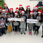 Alumnos de sexto del colegio Iñigo de Toro montan un mercado navideño a favor de la asociación Pyfano Castilla y León. -ICAL.