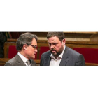 Artur Mas y Oriol Junqueras, en el Parlament.-