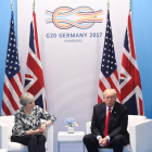 Theresa May y Donald Trump, durante su encuentro en el G-20.-SAUL LOEB / AFP