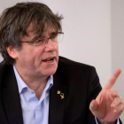 El expresident Carles Puigdemont, este domingo, durante la reunión con el grupo de JxCat en Bruselas.-ULIEN WARNAND (EPA)