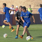 Garitano presiona a Alfaro en el primer entrenamiento de pretemporada del Real Valladolid.-Miguel Ángel Santos