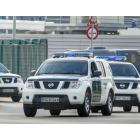 Agentes de la Guardia Civil salen del Port de Barcelona.-RICARD FADRIQUE