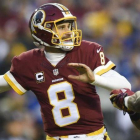 Kirk Cousins lanza el balón.-AP / NICK WASS