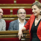 Carme Forcadell, delante de los diputados de JxSí Lluís Llach y Jordi Turull.-AP / MANU FERNÁNDEZ / EFE / ANDREU DALMAU
