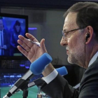 El presidente del Gobierno Mariano Rajoy, durante su aparición como comentarista en la Cope.-EFE / JUAN CARLOS HIDALGO