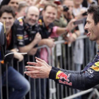 Mark Webber celebra uno de sus podios con el equipo Red Bull.-AP / SILVIA IZQUIERDO