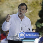 Mariano Rajoy, durante su intervención en el acto del PP celebrado en Soutomior, en Galicia, este domingo.-REUTERS