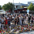 Homenaje a las víctimas de la matanza de Múnich, frente al McDonald's donde tuvo lugar el ataque.-AFP / CHRISTOF STACHE