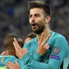 Gerard Piqué, en un partido del Barça.-AP / MARTIN MEISSNER
