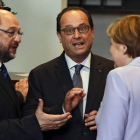 Martin Schulz, François Hollande y Angela Merkel, el pasado 25 de junio en Bruselas.-Foto:   EFE / JULIEN WARNAND