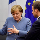 La cancillera Angela Merkel y el presidente Emmanuel Macron, en la cumbre del clima de Bonn (COP23).-JOHN MACDOUGALL (AFP)