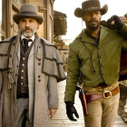 Christoph Waltz (izquierda) y Jamie Foxx, en una escena de la pelicula 'Django desencadenado'.-