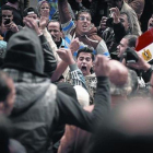 Un grupo de jóvenes se manifiestan contra el presidente Al Sisi, en El Cairo.-AFP / MOHAMED EL SHAHED