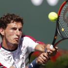Pablo Carreño devuelve un golpe en la semifinal con Wawrinka.-EFE