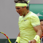 Rafa Nadal celebra la conquista de un punto ante Federer.-
