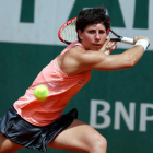 Carla Suárez devuelve una bola a Dominika Cibulkova.-AFP / THOMAS SAMSON