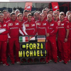 El equipo Ferrari le desea una feliz recuperación a Michael Schumacher.-EFE / ROMAN RÍOS