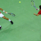 Feliciano López y Marc López, en el partido de dobles perdido ante Rumanía.-EFE / ROBERT GHEMENT