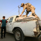 Soldados iraquís inspeccionan vehículos en el norte de Irak.-REUTERS / ESSAM AL-SUDANI