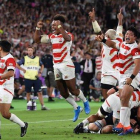 La alegría de los japoneses se desbordó tras la victoria sobre Escocia.-