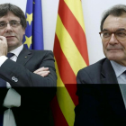 Carles Puigdemont y Artur Mas en una imagen de archivo del Comité Nacional del PDeCAT.-/ ANDREU DALMAU (EFE)