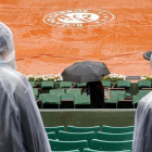 La lluvia ha provocado la suspensión de la jornada en Roland Garros-EFE / ROBERT GHEMENT
