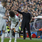 Marcelo, durante el partido del sábado ante el Málaga en el que cayó lesionado.-AP / FRANCISCO SECO