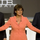 José Luís Rodríguez Zapatero y Mariano Rajoy junto a Olga Viza, moderadora del cara a cara que enfrentó a los candidatos en el 2008.-AP / VICTOR R CAIVANO