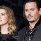 Amber Heard y Johnny Deep.-