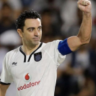 Xavi, en un partido con el Al Sadd.-AFP / KARIM JAAFAR