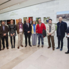 El presidente de la Diputación de Valladolid, Jesús Julio Carnero, visita la exposición del colectivo Simancas en el Museo Provincial del Vino.-ICAL