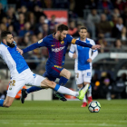 Messi, en acción, en un partido en el que ha conseguido tres goles, los tres del Barça.-JORDI COTRINA