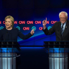 Hillary Clinton y Bernie Sanders, ayer en Flint, durante un momento del debate.-AP / JAKE MAY