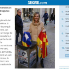 Caputra de pantalla de la entrevista en formato digital en la que la candidata por Lleida del PP, Marisa Xandri, se fotografió lanzando una estelada a la papelera.-/ ÒSCAR MIRÓN (SEGRE.COM)