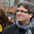 Carles Puigdemont, en Bruselas, el pasado 12 de enero con los diputados de Junts per Catalunya.-JOHN THYS (AFP)