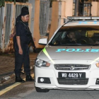 La policía malasia, durante un operativo oficial.-AFP / / MOHD RASFAN