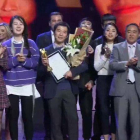 Los ganadores del concurso celebran el final de la edición en la televisión china.-EFE