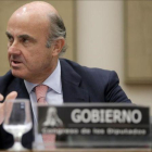 Luis de Guindos  ministro de Economía en funciones durante su comparecencia en la Comision de Economía para hablar del 'caso Soria'.-JOSE LUIS ROCA