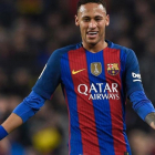 Neymar vio en el negocio de los cromos una oportunidad apra ganar dinero.-AFP / LLUIS GENE