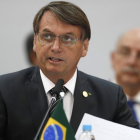 El presidente de Brasil, Jair Bolsonaro, habla durante la Cumbre Mercosur este jueves, en el Vale dos Viñedos en Bento Gonçalves al sur de Brasil.-EFE / MARCELO SAYAO