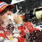 Kimi Raikkonen, en uno de sus muchos podios en la F-1.-AFP / JOHN THYS