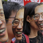 Manifestantes con caretas de Liu Xiaobo en Hong Kong, el 27 de junio.-AP / VINCENT YU