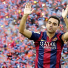 Xavi, el día de su despedida del Camp Nou, en mayo pasado.-REUTERS / GUSTAU NACARINO