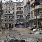 Fotografía facilitada por la Agencia Árabe Siria de Noticias (SANA) que muestra a los daños en los edificios del distrito de Al Sukari y Ansari de Alepo, ayer.-EFE